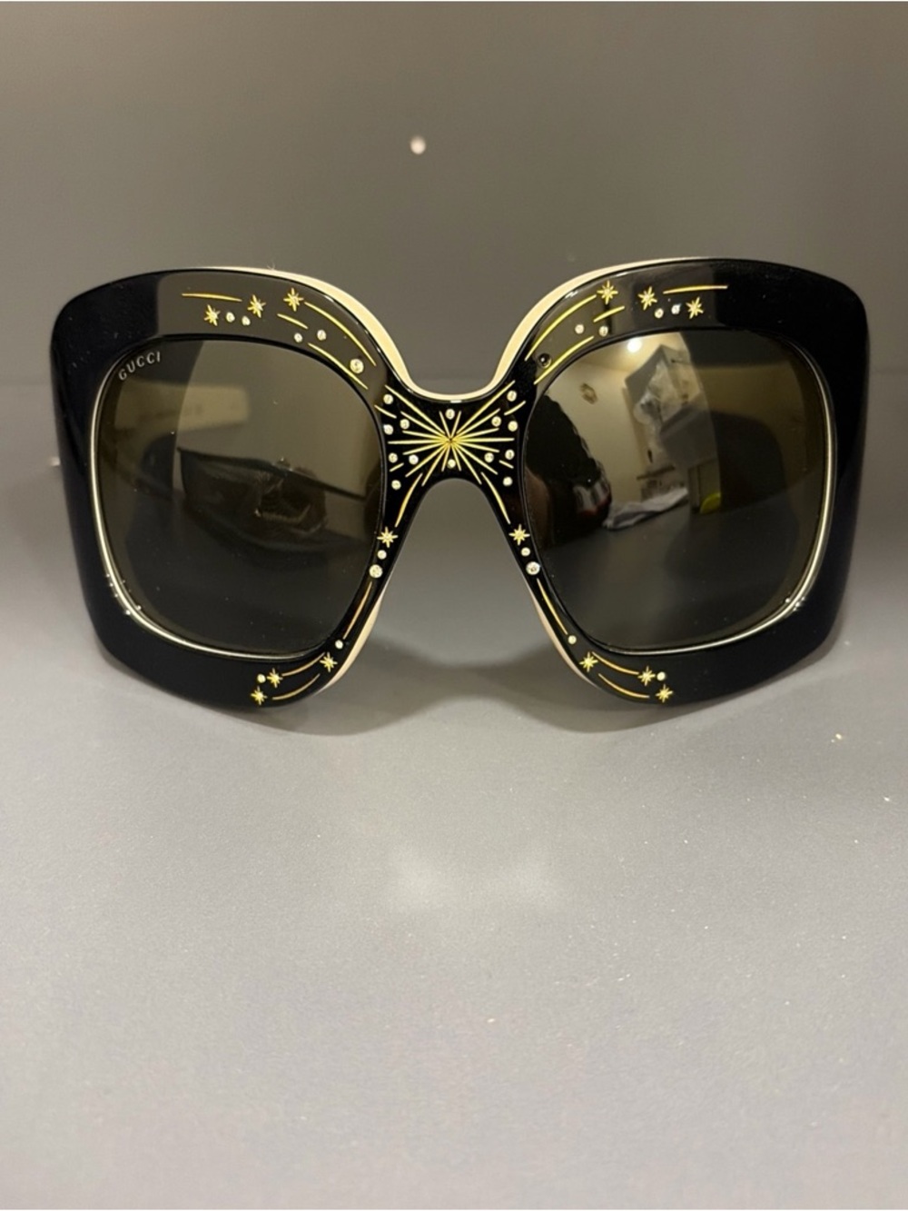 Gucci Black Sunglasses with Gold Starburst Accents